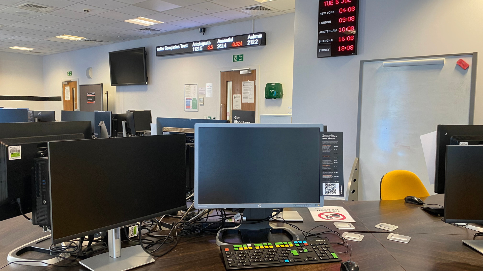 Man at his desk using a Bloomberg Terminal